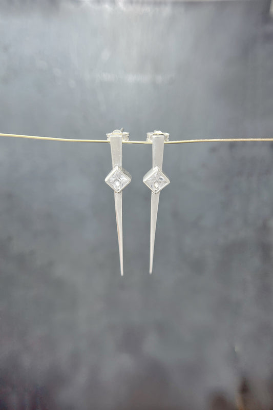 long spike earrings / white sapphire