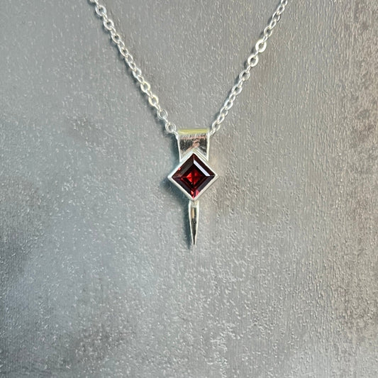 tiny square spike / garnet