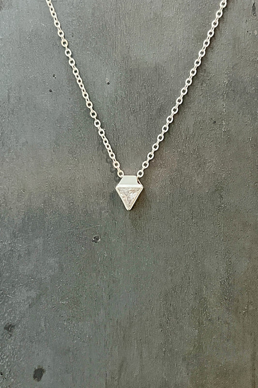 tiny triangle / white cubic zirconia